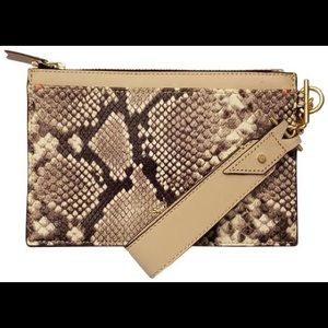 India Hicks snake skin wristlet